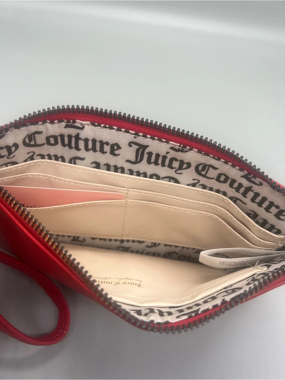 Juicy couture heart to heart wristlet